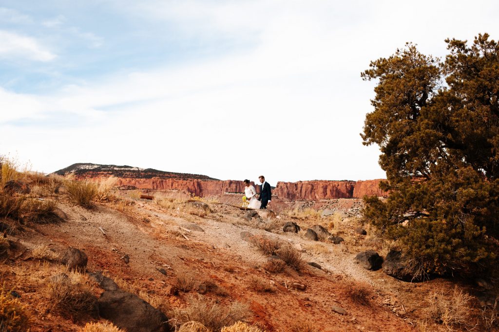 Couple walking at their Zion wedding