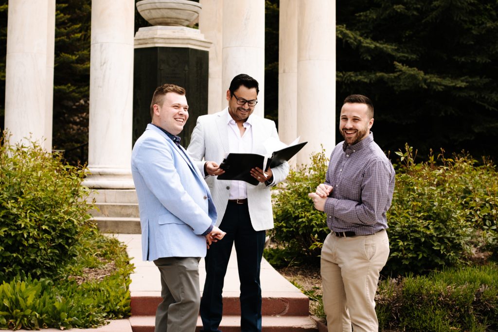 LGBTQ+ couple at their wedding near the Utah State Capitol