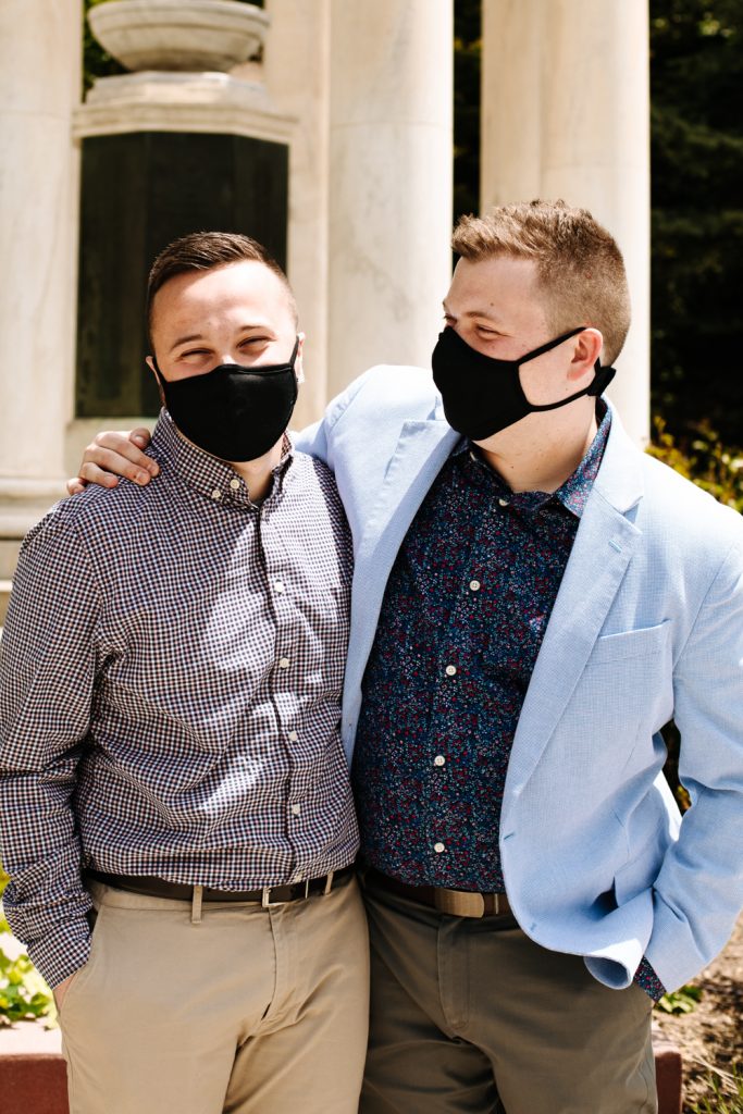 LGBTQ+ couple with masks at their wedding near the Utah State Capitol.