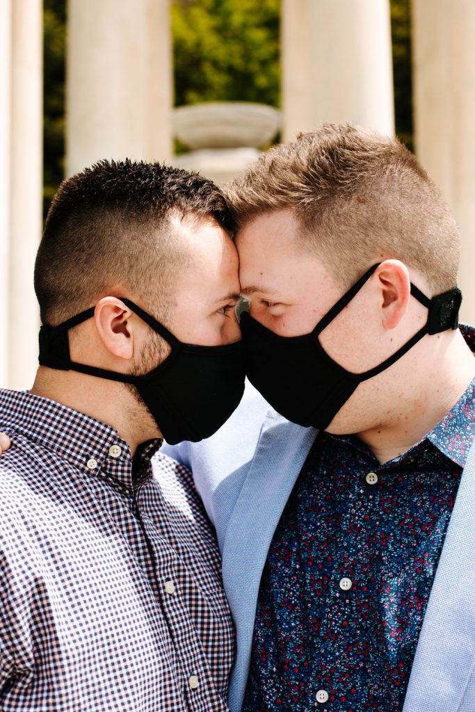 LGBTQ+ couple with masks at their wedding near the Utah State Capitol.