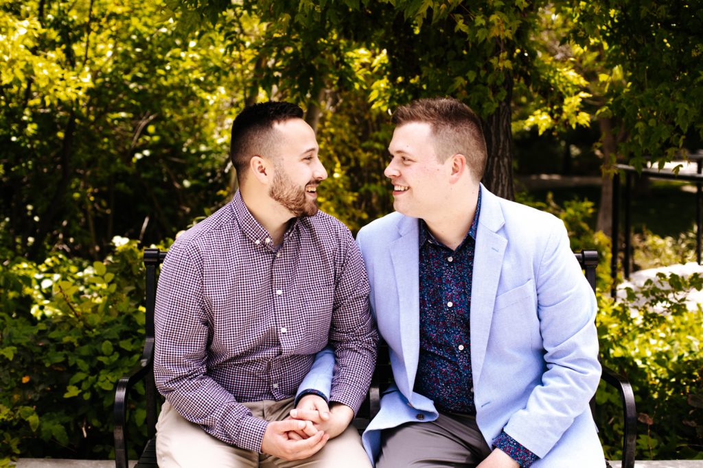 LGBTQ+ couple at their wedding near the Utah State Capitol.