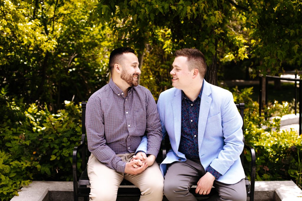 LGBTQ+ couple at their wedding near the Utah State Capitol.